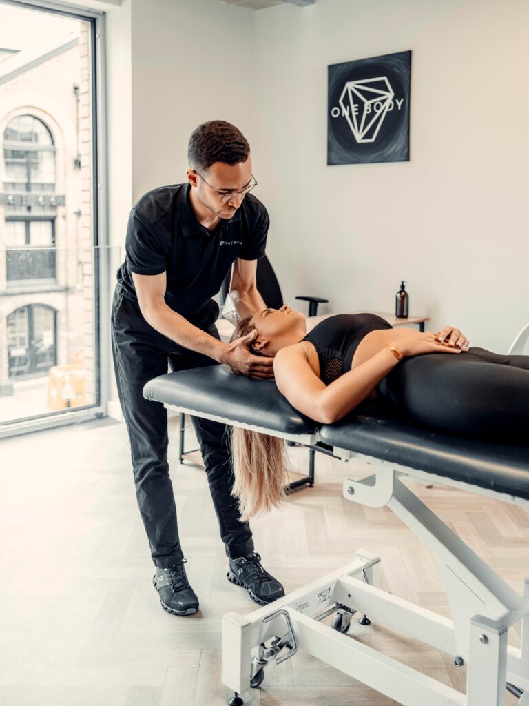 physiotherapist treating neck pain