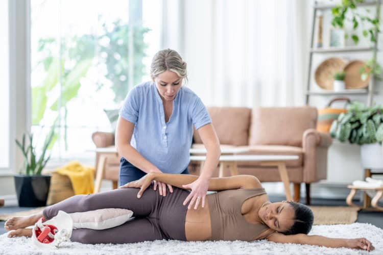 Prenatal physiotherapy session focusing on pelvic alignment support - One Body LDN Prenatal physiotherapy session focusing on pelvic alignment support