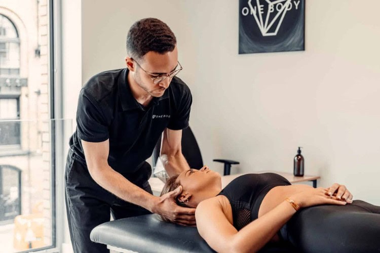 1 One Body LDN therapist performing head pain relief therapy session - One Body LDN One Body LDN therapist performing head pain relief therapy session