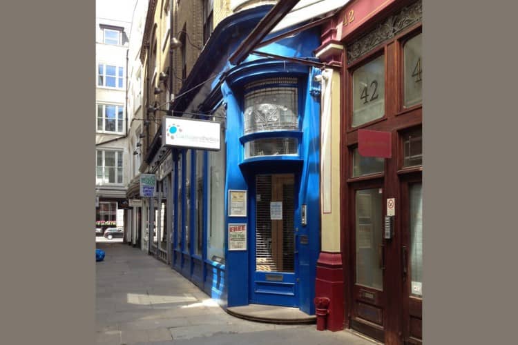 10 Front entrance of London Migraine Clinic with blue door and signage - One Body LDN Front entrance of London Migraine Clinic with blue door and signage