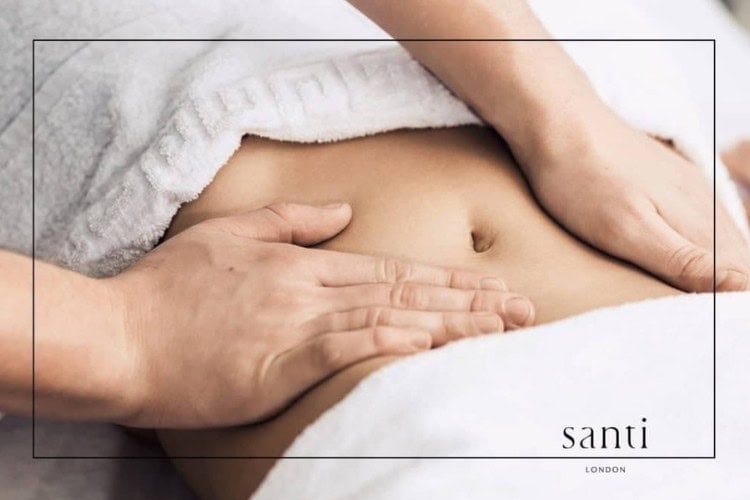 Abdominal deep tissue massage session at Santi London spa