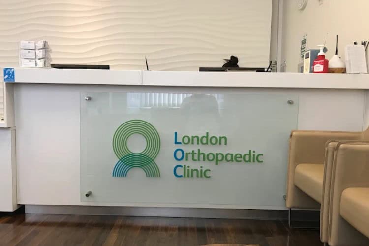 3 London Orthopaedic Clinic reception desk with modern minimalist design - One Body LDN London Orthopaedic Clinic reception desk with modern minimalist design