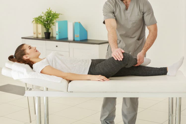 London Knee Clinic specialist assessing patients leg movement