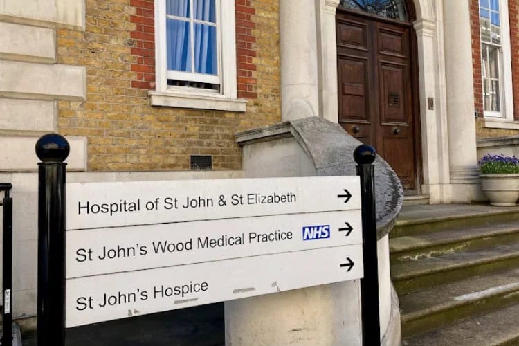 6 Directional sign outside St John St Elizabeth Hospital London - One Body LDN Directional sign outside St John St Elizabeth Hospital London