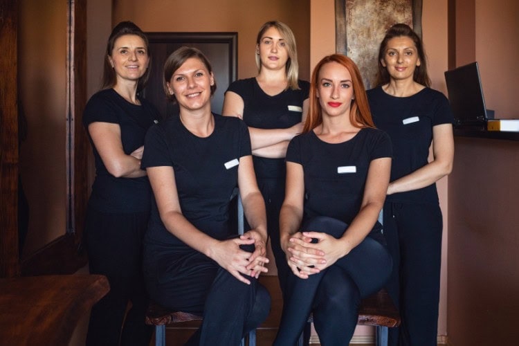 Team of professional sports massage therapists in London clinic