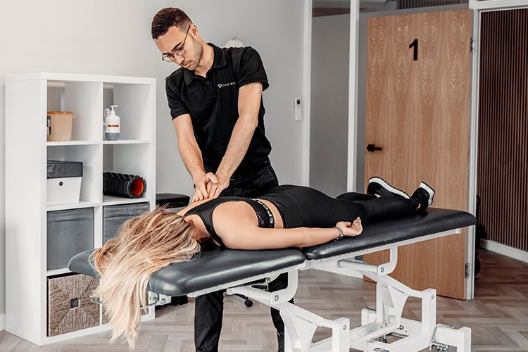 Therapist performing sports massage vs deep tissue vs swedish