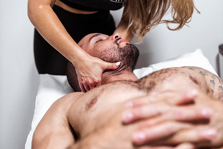 Physiotherapist Performing Manual Neck Therapy Treatment