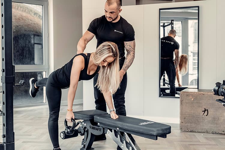 Physiotherapy gift card training with guided kettlebell exercise