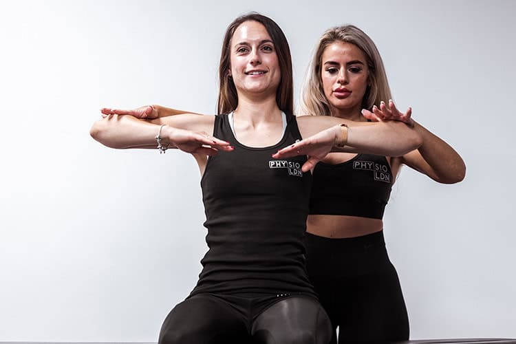 Patient getting wrist pain therapy in London