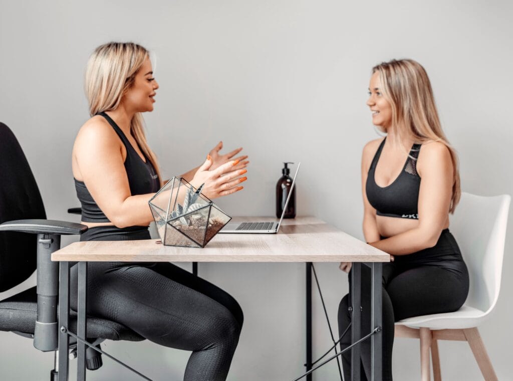 Physiotherapist conducting an initial consultation with a patient at London clinic